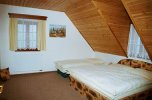 Druhá ložnice levého apartmánu